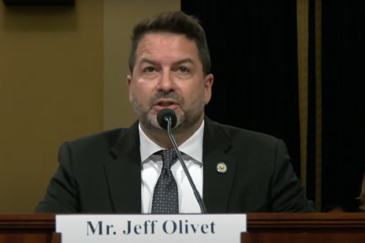 USICH Director Olivet testifying in front of Congress.